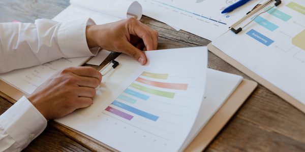 Colourful performance charts and reports representing automated workflows